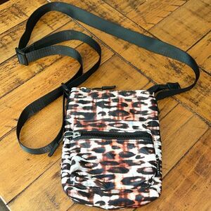 Tahari leopard print nylon crossbody bag